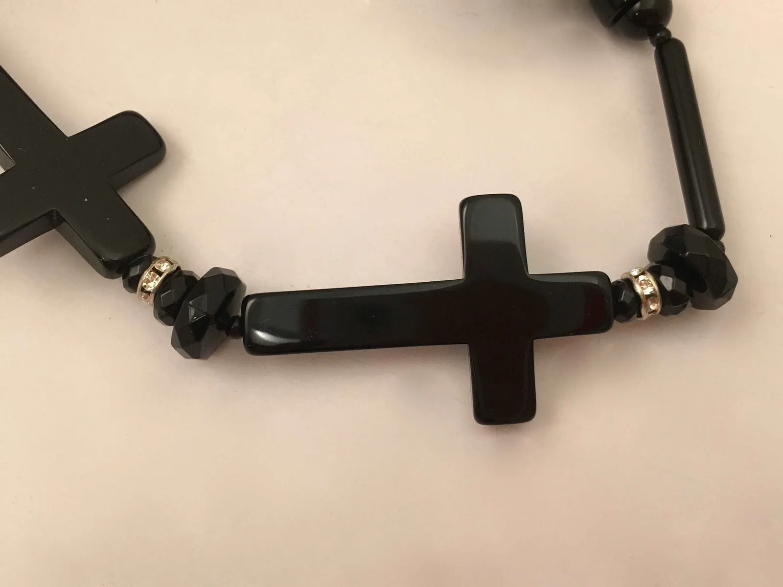 Cinematic Glamour: Angela Caputi Black Resin Cross Design Necklace